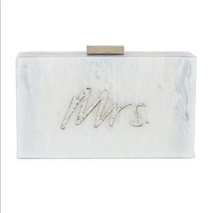 Mrs. bag can be made into a clutch or satchel.